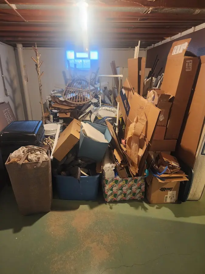 Roll-off dumpster container at job site for 2 Yard Dumpster Rental in Fridley